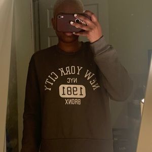 olive green sweatshirt